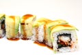 Roll with caviar of salmon. Sushi with caviar of flying fish. Japanese food on a beautiful dish.