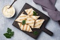 Roll with cheese and herbs. Grilled pita bread with filling. Cucumber radish salad. The concept of a healthy Breakfast Royalty Free Stock Photo