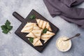 Roll with cheese and herbs. Grilled pita bread with filling. Cucumber radish salad. The concept of a healthy Breakfast. Royalty Free Stock Photo