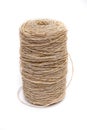 A roll or coil of natural rope or jute twine on white background Royalty Free Stock Photo