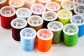 The roll of colorful thread on background,needlework,craft,sewing and tailoring concept,warm light tone Royalty Free Stock Photo