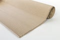 roll of corrugated cardboard isolated on white background for advertising Royalty Free Stock Photo