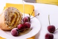 Roll with cream and cherries. Summer dessert with berries Royalty Free Stock Photo