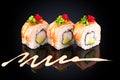 Roll with eel, crab, avocado, cream cheese and spicy sauce