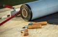 Roll of EPDM Roofing Rubber Material and Some Tools Royalty Free Stock Photo
