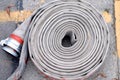 A roll of fire-resistant fire hose