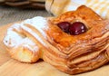 Roll from flaky pastry with cherry Royalty Free Stock Photo