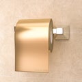 Roll of gold colored toilet paper