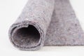 Roll of gray Thick fabric on the white background