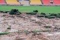 Roll green lawn grass sod for laying on football soccer field Royalty Free Stock Photo