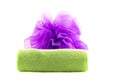 Roll of green towel with purple sponge Royalty Free Stock Photo