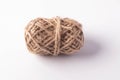 A roll of light brown rope on a white background Royalty Free Stock Photo