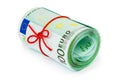 Roll of money and bow Royalty Free Stock Photo