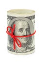 Roll of money and bow Royalty Free Stock Photo