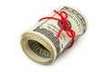 Roll of money and bow Royalty Free Stock Photo