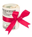 Roll of money with a red bow Royalty Free Stock Photo