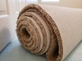 Roll of new carpet in the bedroom of house for replace Royalty Free Stock Photo