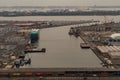 A roll on roll off car carrier ship - ro-ro ship berthed in the Port Newark Chanel