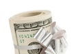 Roll of One Hundred Dollar Bills With Silver Bow on White Royalty Free Stock Photo