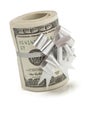 Roll of One Hundred Dollar Bills Tied Silver Bow on White Royalty Free Stock Photo