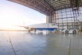 Roll-out of the aircraft from the hangar by a aerodrome tractor, after repair.