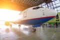 Roll-out of the aircraft from the hangar by a aerodrome tractor, after repair.