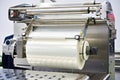 Roll of packaging film on machine food factory Royalty Free Stock Photo