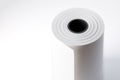Roll of paper for cash register. White office paper roll on white background Royalty Free Stock Photo
