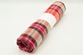 Roll pink and white plaid fabric
