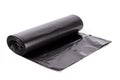 Black roll of plastic garbage bags isolated on white background Royalty Free Stock Photo