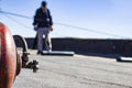 Roll roofing Installation with propane blowtorch during construction works Royalty Free Stock Photo