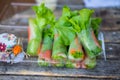 Roll of salad roll Hydroponics vegetable, green leaf lettuce, carrot and crab sticks Royalty Free Stock Photo