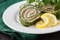 Roll salted salmon, cream cheese and spinach Royalty Free Stock Photo