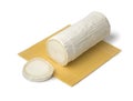 Roll of soft white organic goat cheese and slice