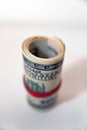 A roll of USD bills held with an elastic band Royalty Free Stock Photo