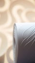 A roll of white paper with swirls on it, AI Royalty Free Stock Photo