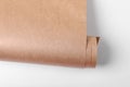 Roll of wrapping paper on white background, top view Royalty Free Stock Photo