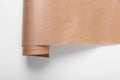 Roll of wrapping paper on white background, top view Royalty Free Stock Photo