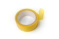 Roll of yellow masking tape on white background