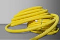 Roll of yellow plastic cable cover