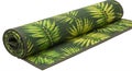 Rollable yoga mat with a tropical leaf pattern, featuring vibrant shades of green. The Royalty Free Stock Photo