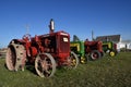 McCormick Deering and John Deere tractors at a farm show Royalty Free Stock Photo