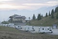 PASSO ROLLE, DOLOMITES, ITALY, 26 SEPTEMBER, 2021: Campers in the parking of Hotel Venetia in Passo Rolle, Dolomites. Royalty Free Stock Photo