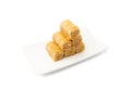 Rolled Baklava Isolated, Ramadan Dessert Roll on Restaurant Plate, Eastern Sweet Pastries