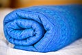 Rolled blue baby sling Royalty Free Stock Photo