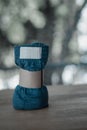 Rolled blue folded men boxer briefs with brown paper Royalty Free Stock Photo