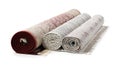 Rolled carpets on white background. Interior element Royalty Free Stock Photo