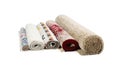 Rolled carpets on white background. Interior element Royalty Free Stock Photo