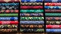 Rolled Colorful Batik Fabrics Stacks in Textile Shop Royalty Free Stock Photo