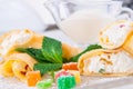 Rolled crepes with cottage cheese